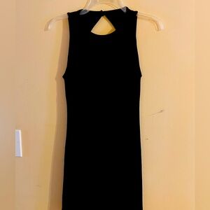 LBD Little Black Dress. Built in bra. Keyhole back. Above the knee. Size small.